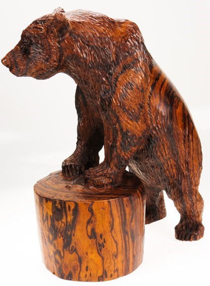 Bear on tree stump - Ironwood Carving  |  EarthView
