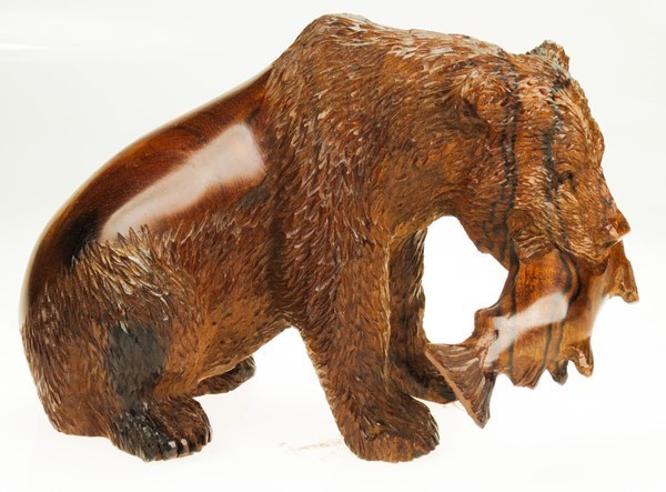 View Detailed Grizzly Bear Sitting with Fish